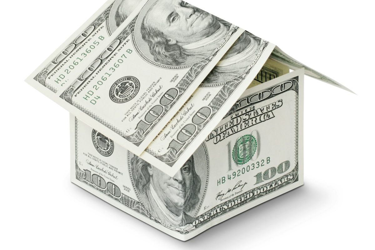 Una casa hecha de dinero que representa el valor en UF